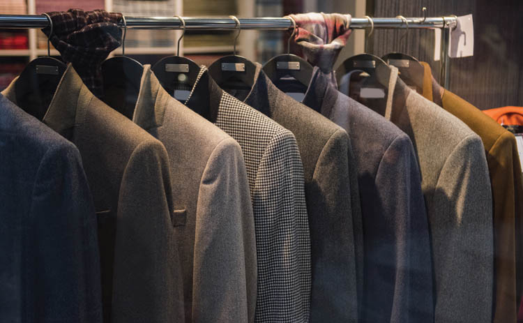 Men suits in a store in London | City Confidential